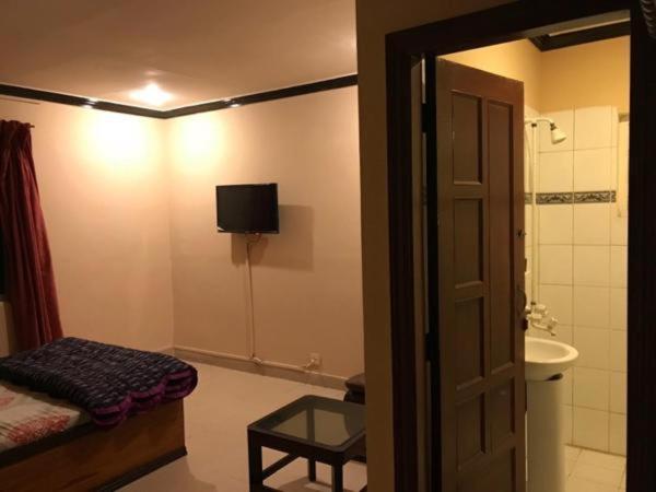 Hotel Babar House à Faisalabad Extérieur photo