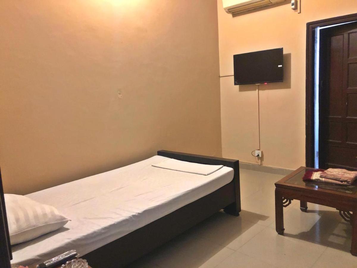 Hotel Babar House à Faisalabad Extérieur photo